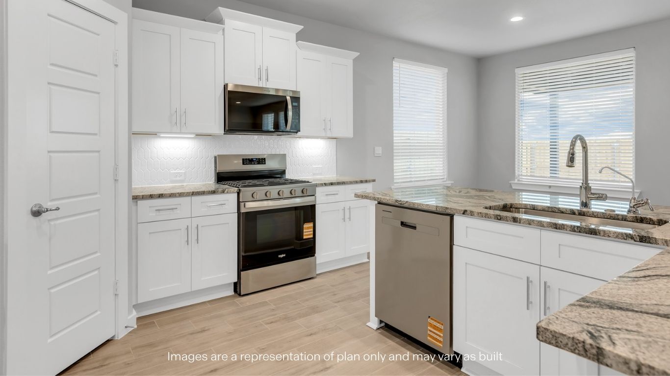 Spacious open concept kitchen with island and counter prep space