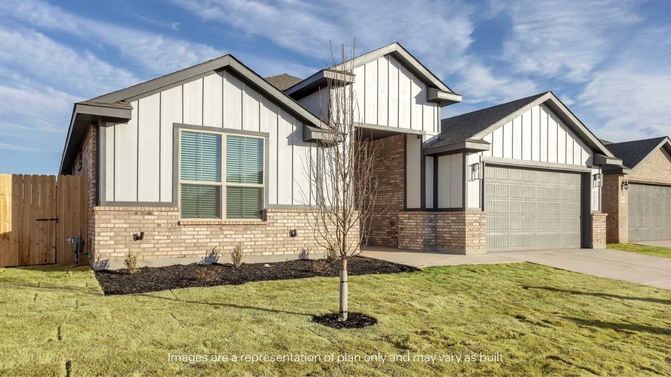 Side view of single story timeless brick home