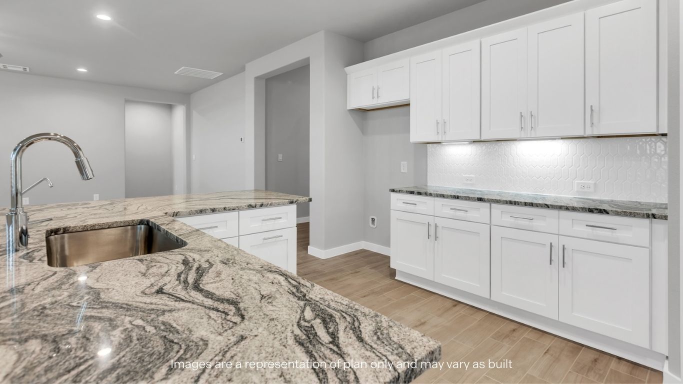 Spacious open concept kitchen with island and counter prep space