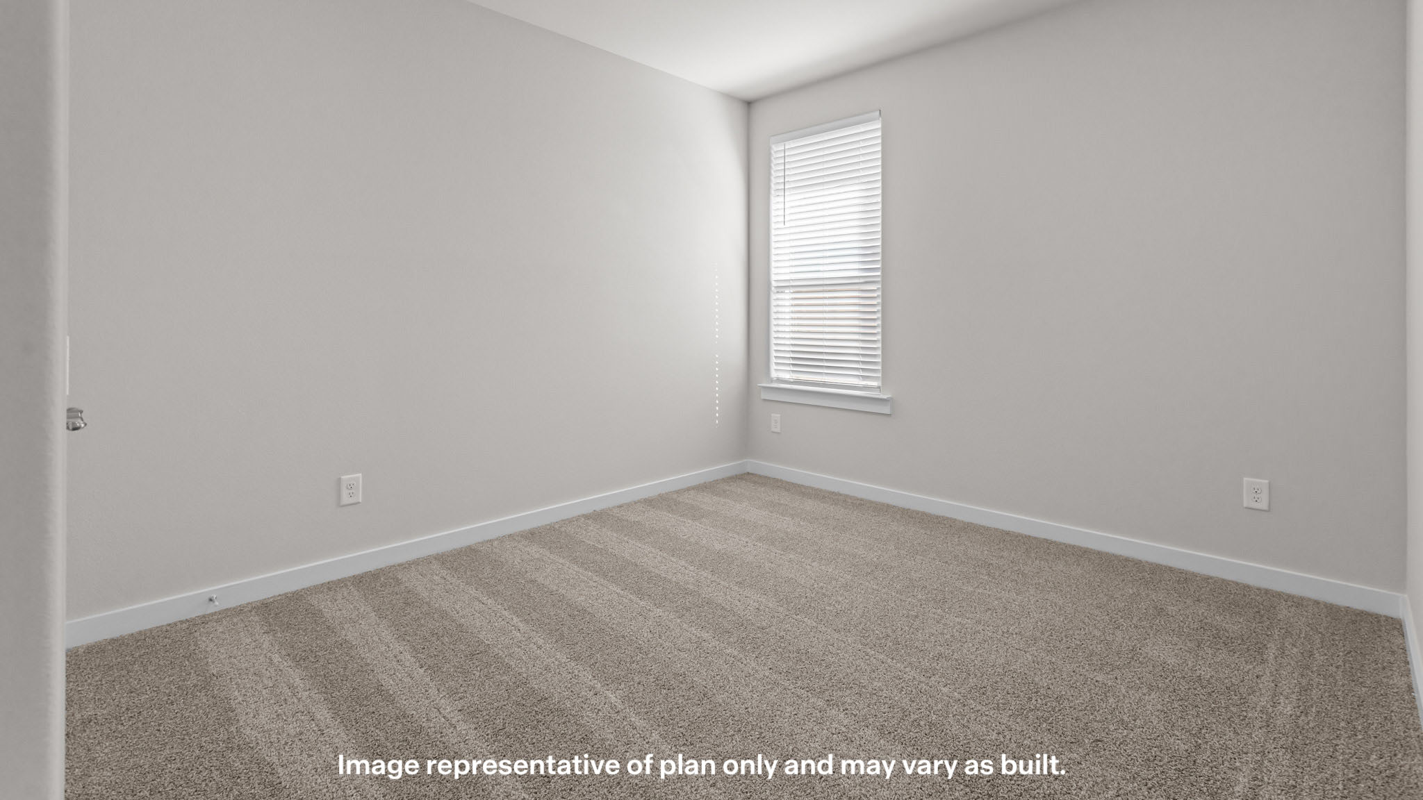 Guest bedroom 2 with side window and plush carpet floor
