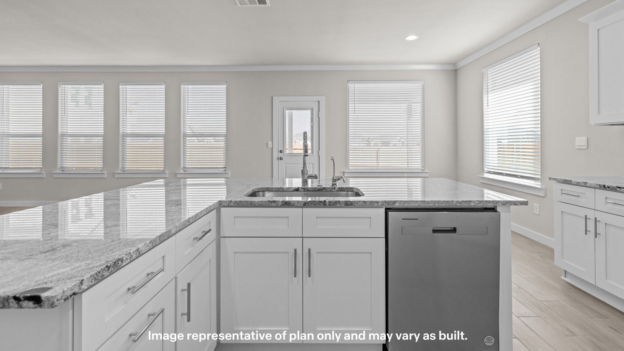 Open concept kitchen, living, family, and dining room space