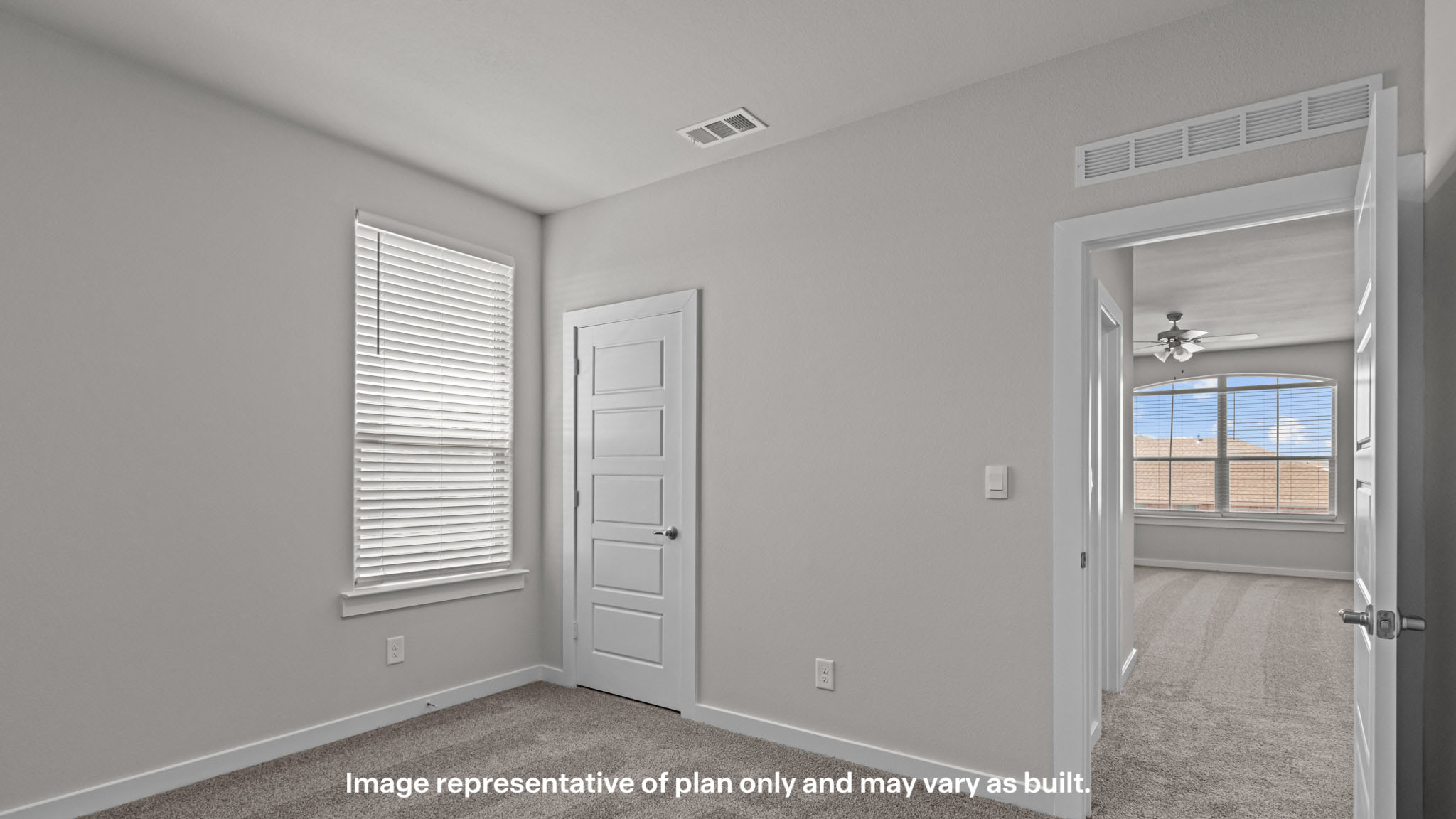 Upstairs guest bedroom 2 with plush carpet floors
