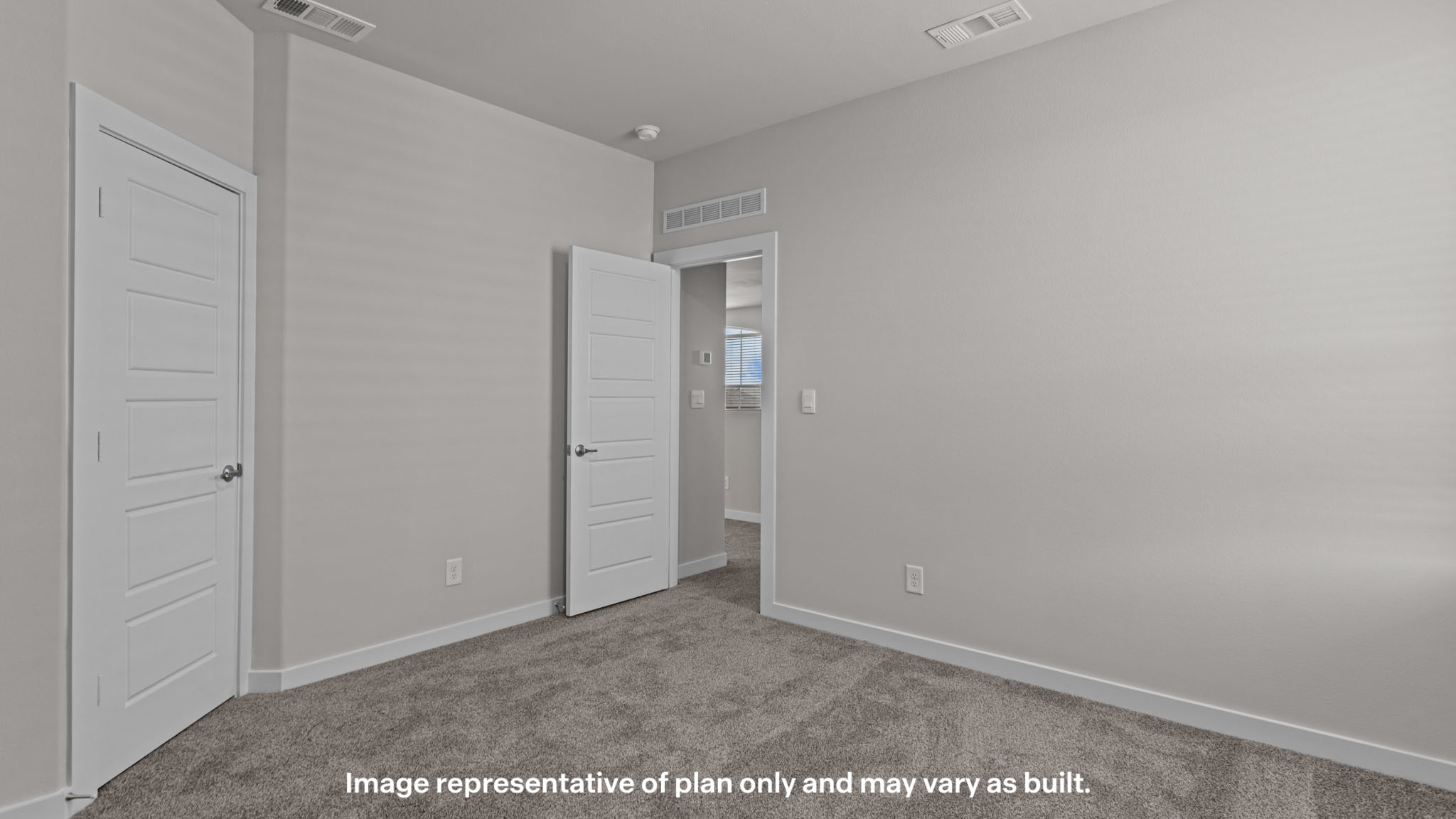 Upstairs guest bedroom 3 with plush carpeted floors and ample natural light