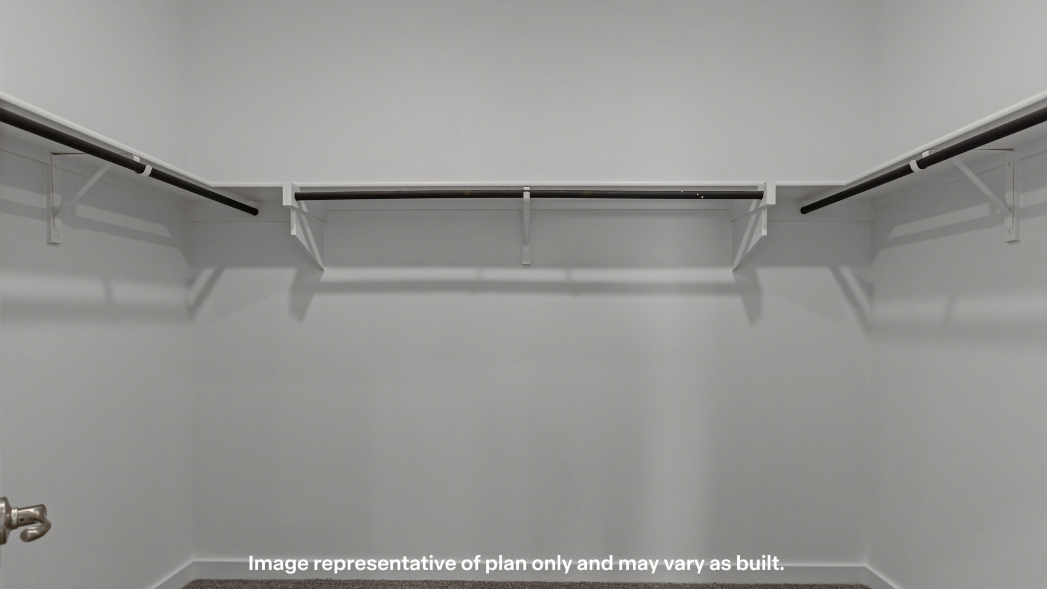 Private primary walk-in closet with extra storage space