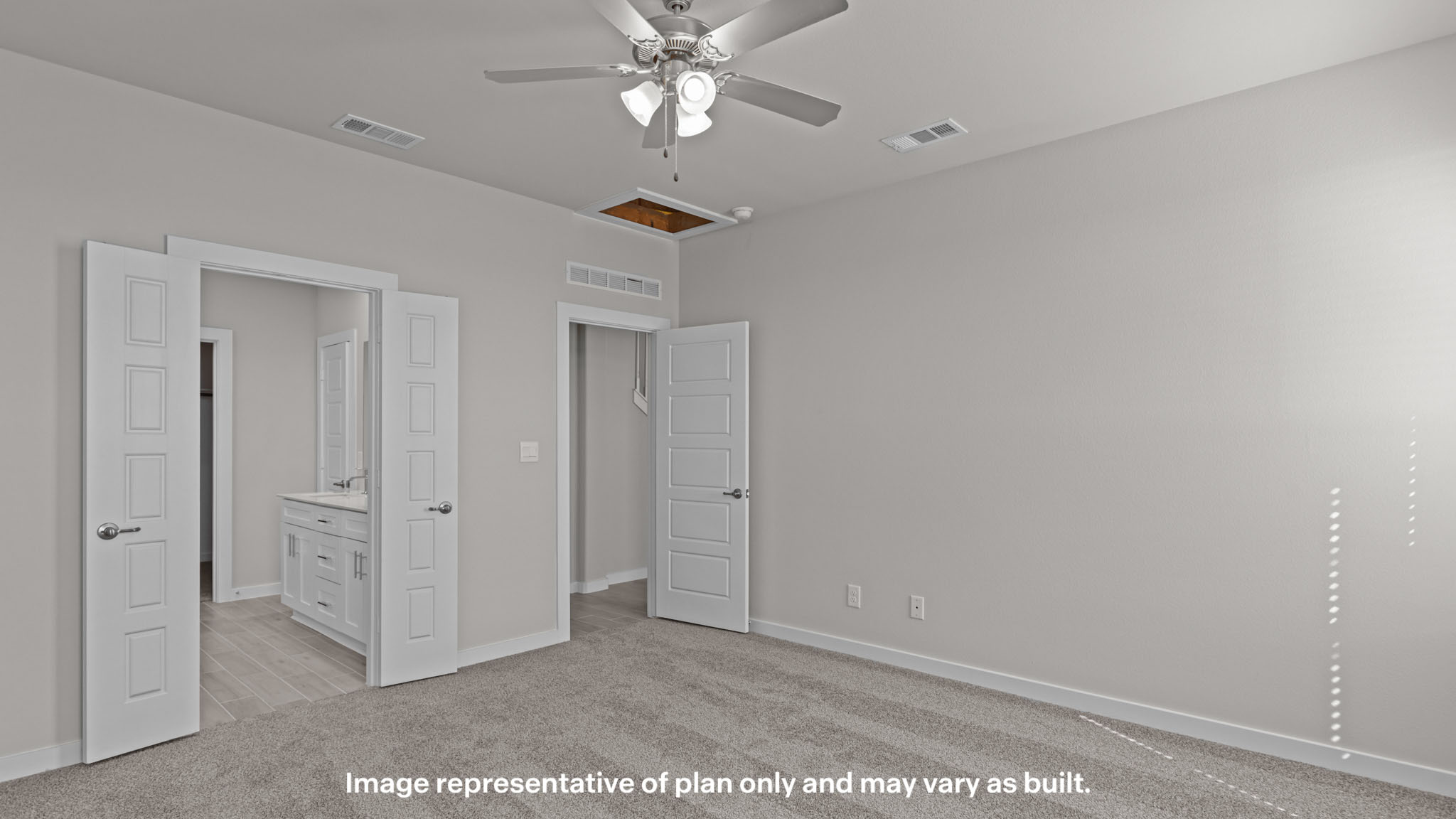 Primary bedroom with private attached bathroom and walk-in closet