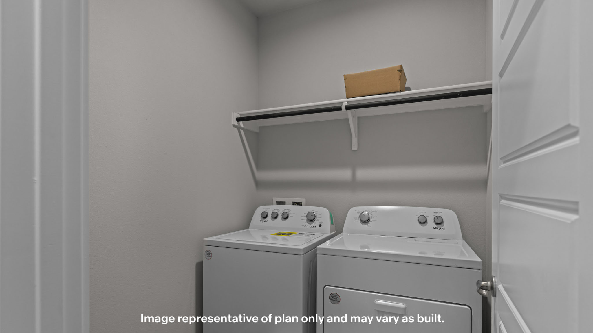 Laundry room and utility closet space with extra storage