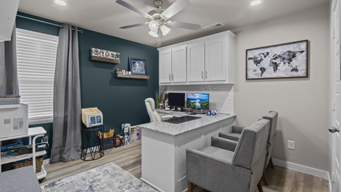 Guest bedroom which can be utilized as a spacious office or bedroom space