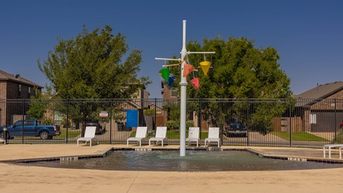 Neighborhood amenities splash pad/tot lot kids pool