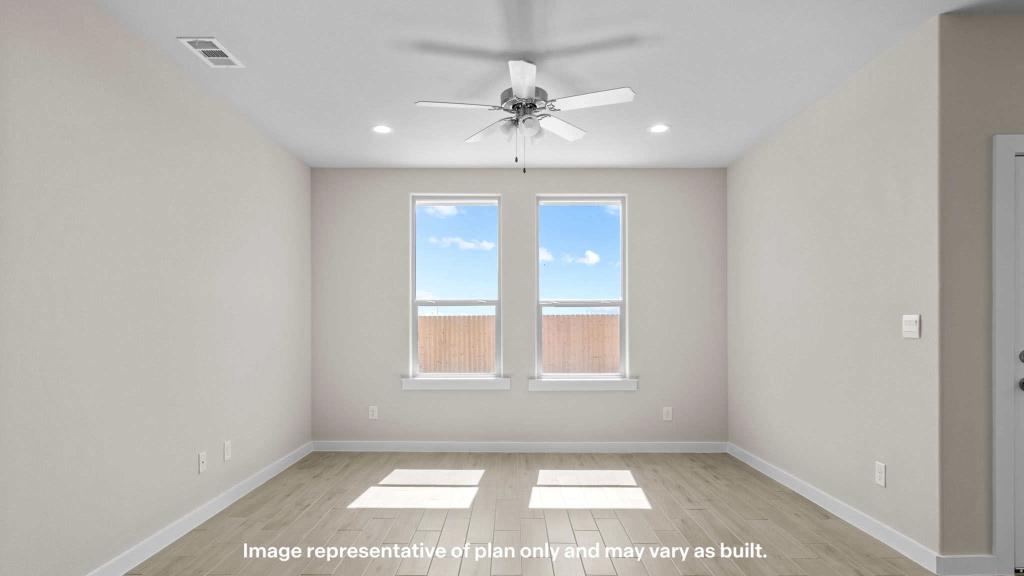 Open living and family room area with ample natural light