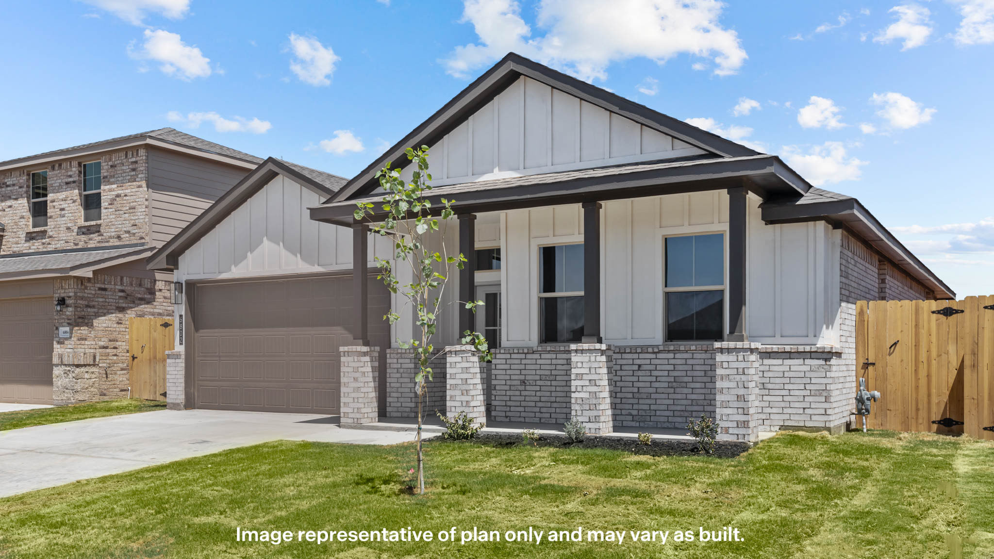 Single story classic brick home with front entry