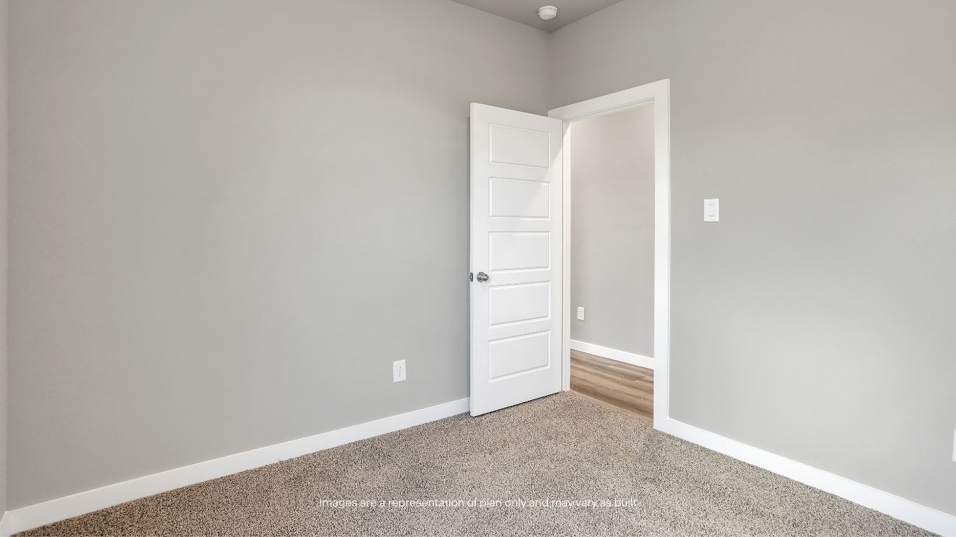 This versatile bedroom includes a closet and flexible layout, making it ideal for a bedroom, office, workout room, or playroom.