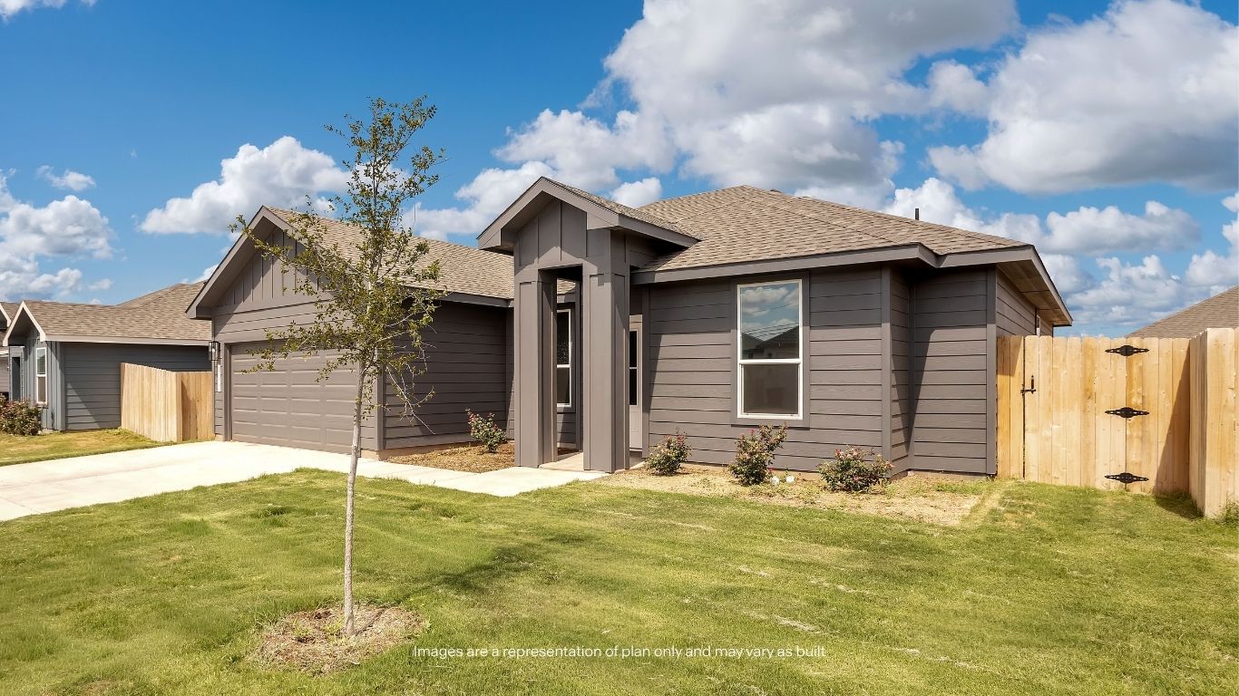 A beautiful front elevation highlights the home's stylish design and inviting entrance, creating a warm first impression.