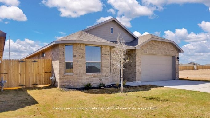 Side view of single story timeless brick home