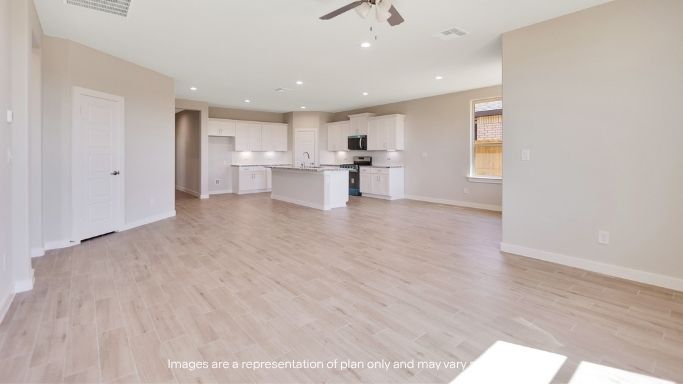 Open living and family room area with ample natural light