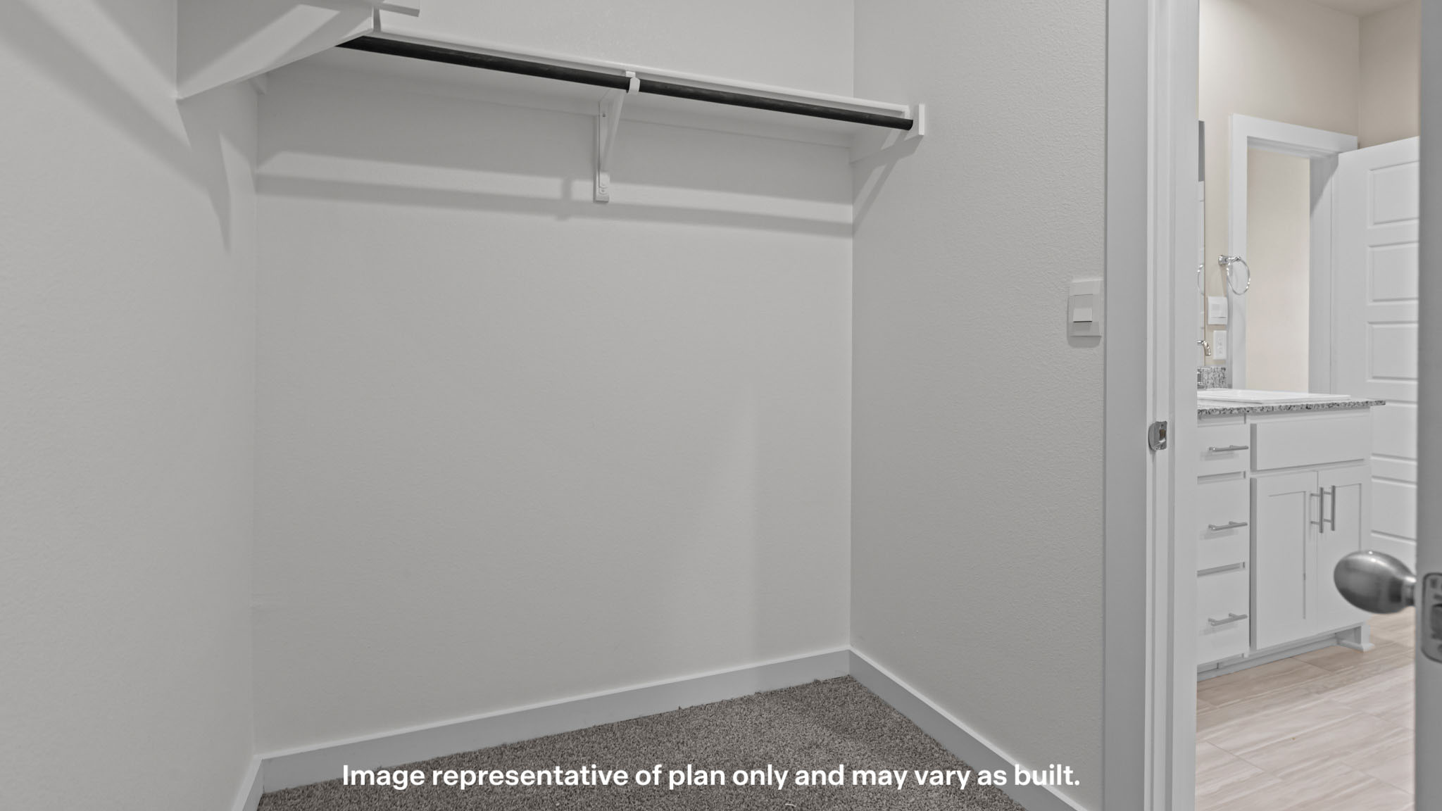 Primary walk-in closet with extra storage space