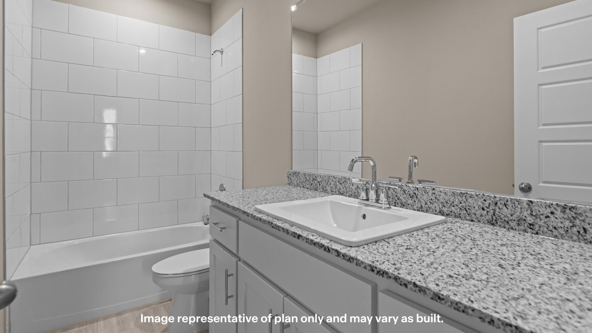 Guest bathroom with built in vanity and combination bathtub shower