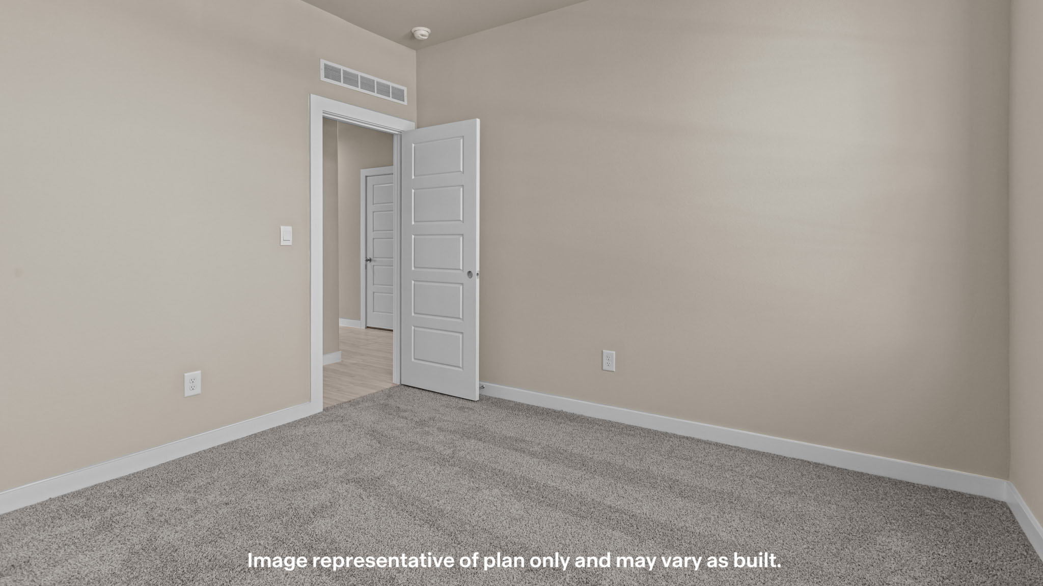 Guest bedroom 1 with plush carpet floors