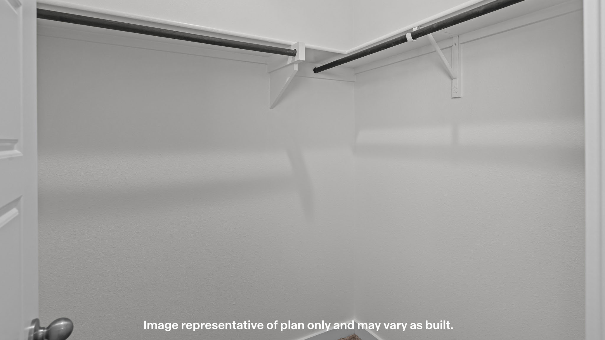 Primary walk-in closet with extra storage space