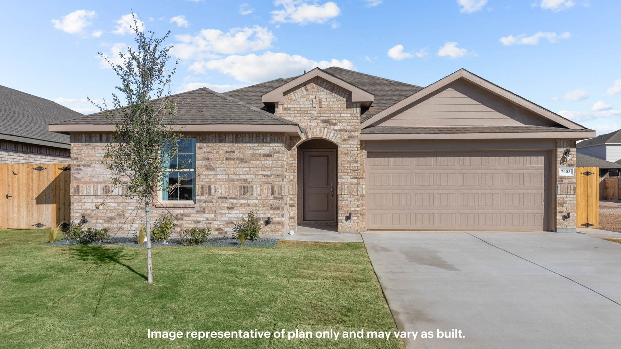 Exterior of single story modern brick style home