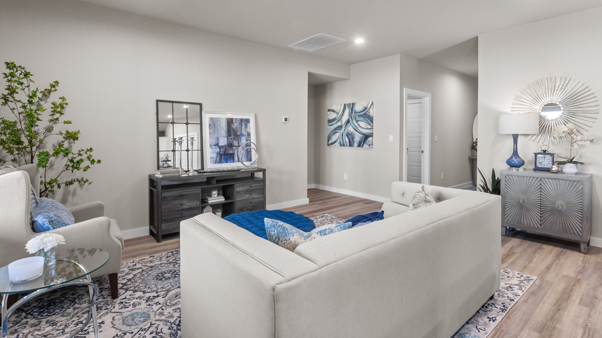 Open living and family room area with ample natural light