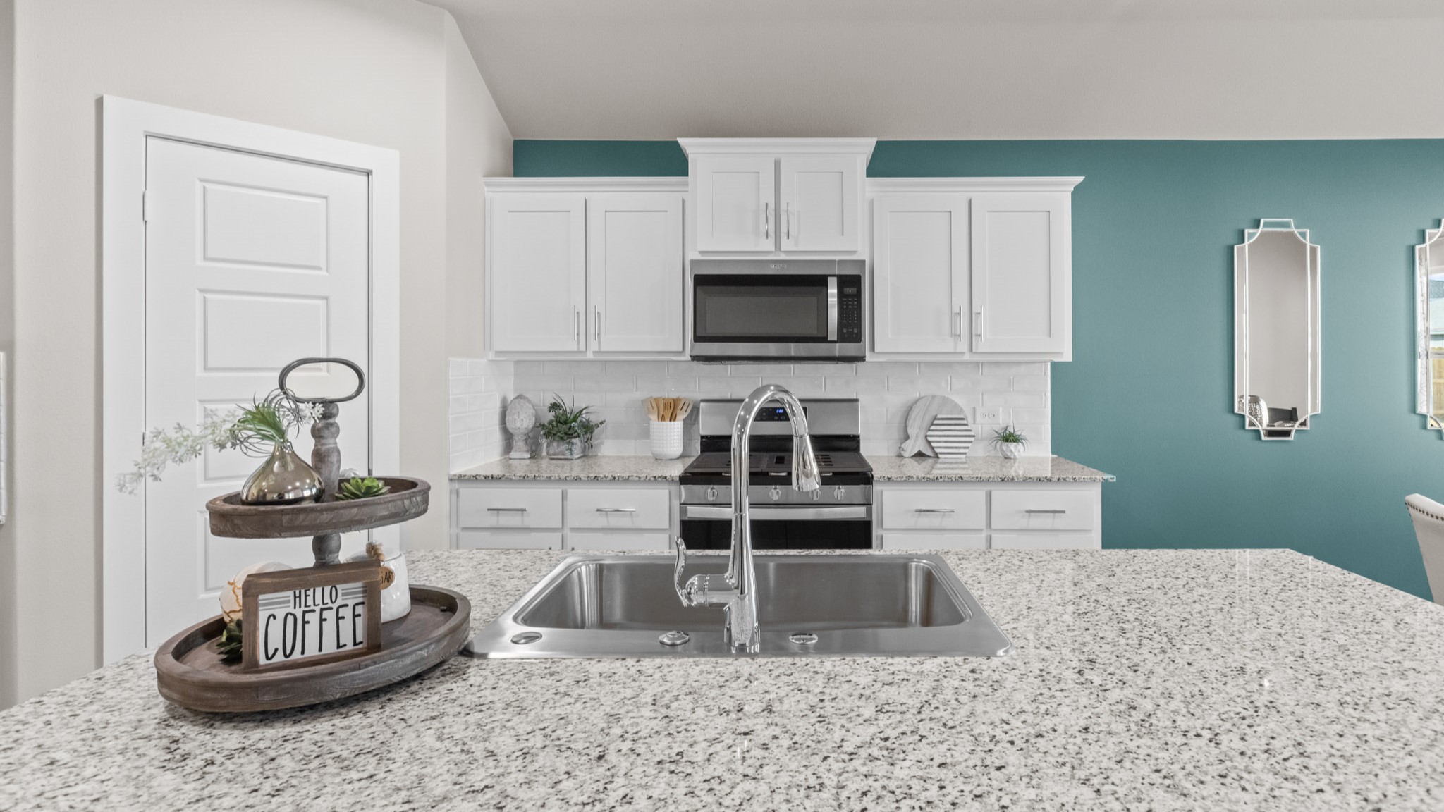 Spacious open concept kitchen with island and counter prep space