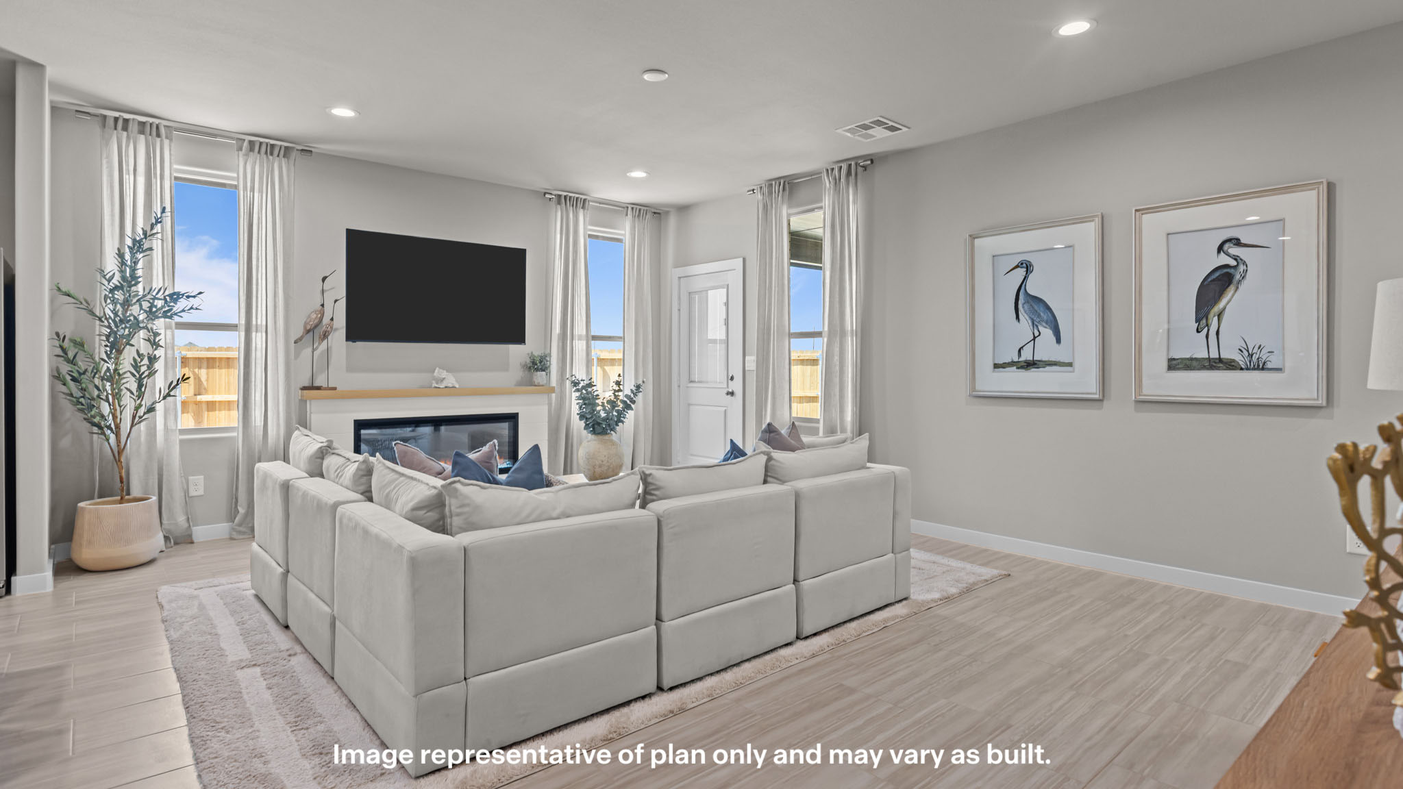 Open living and family room area with ample natural light