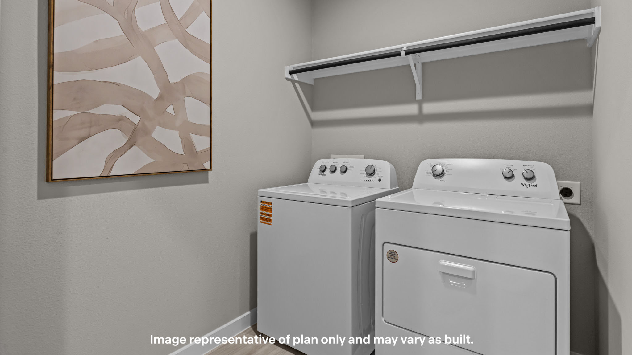 Laundry room and utility closet space with extra storage