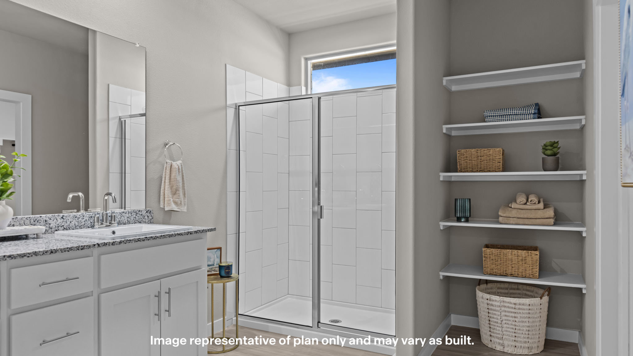 Primary bathroom with luxurious shower and built in storage