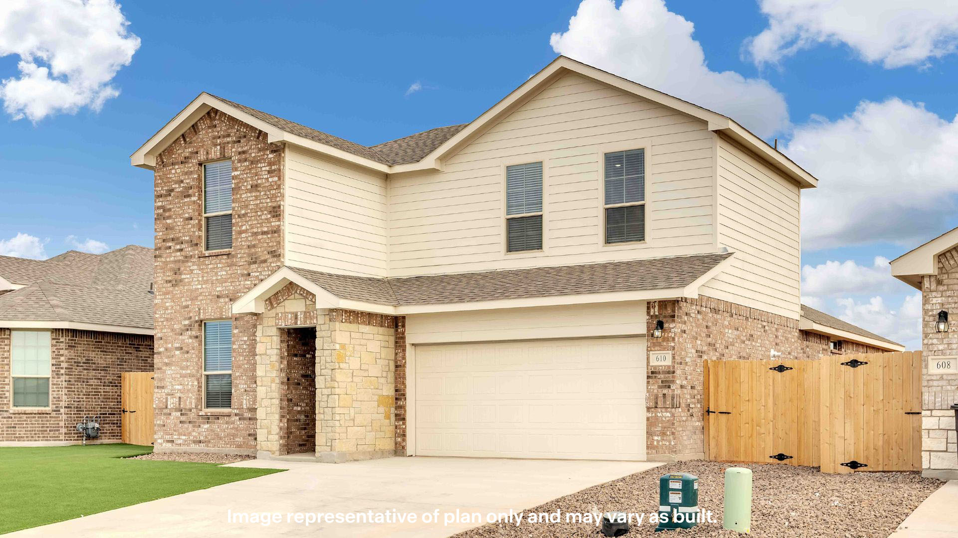 Side view of two story classic brick home