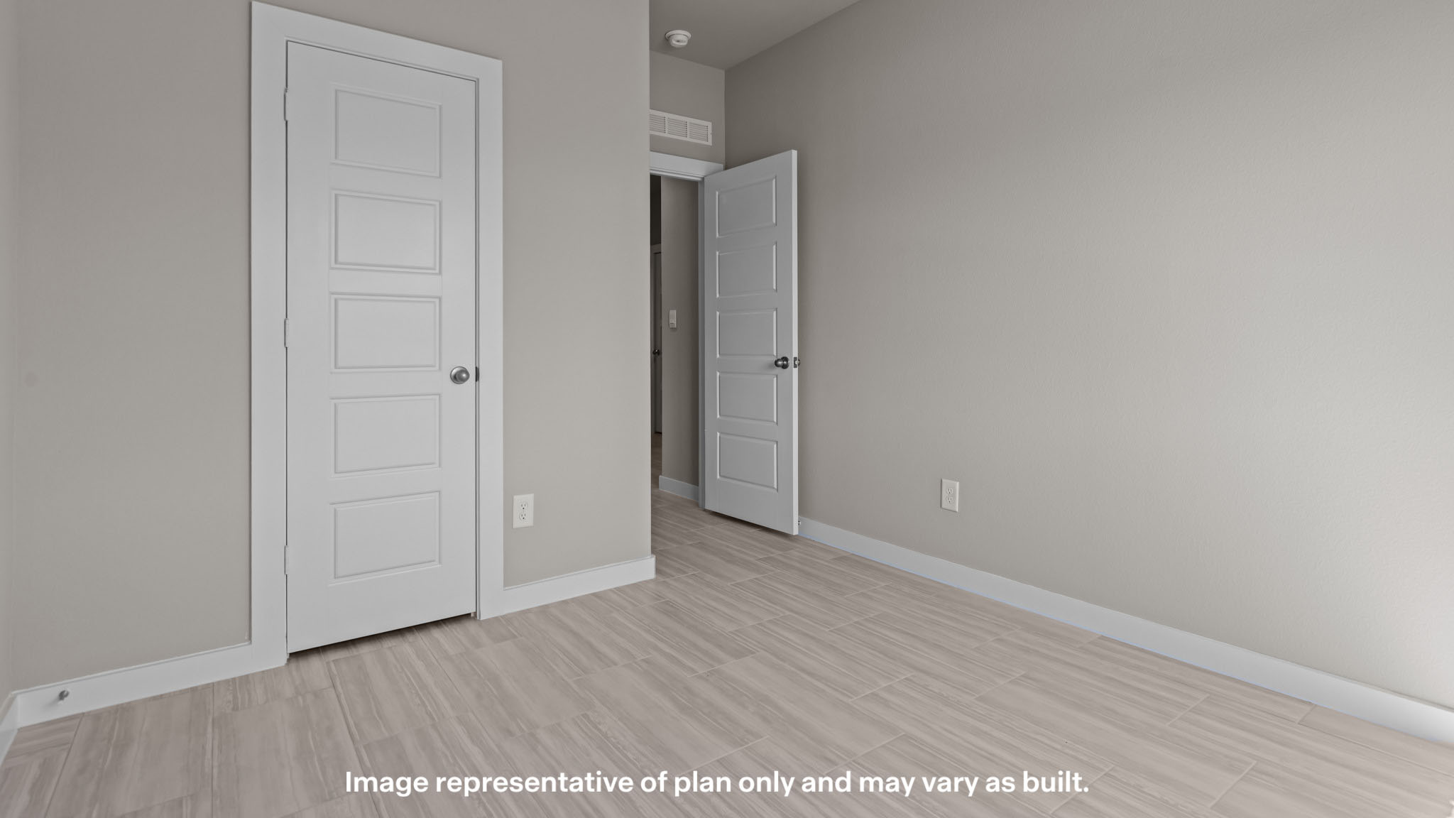 Upstairs guest bedroom 2 with plush carpet floors