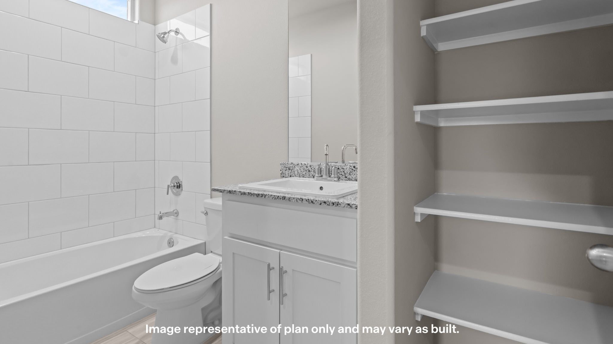 Upstairs guest bathroom with combination shower and bathtub