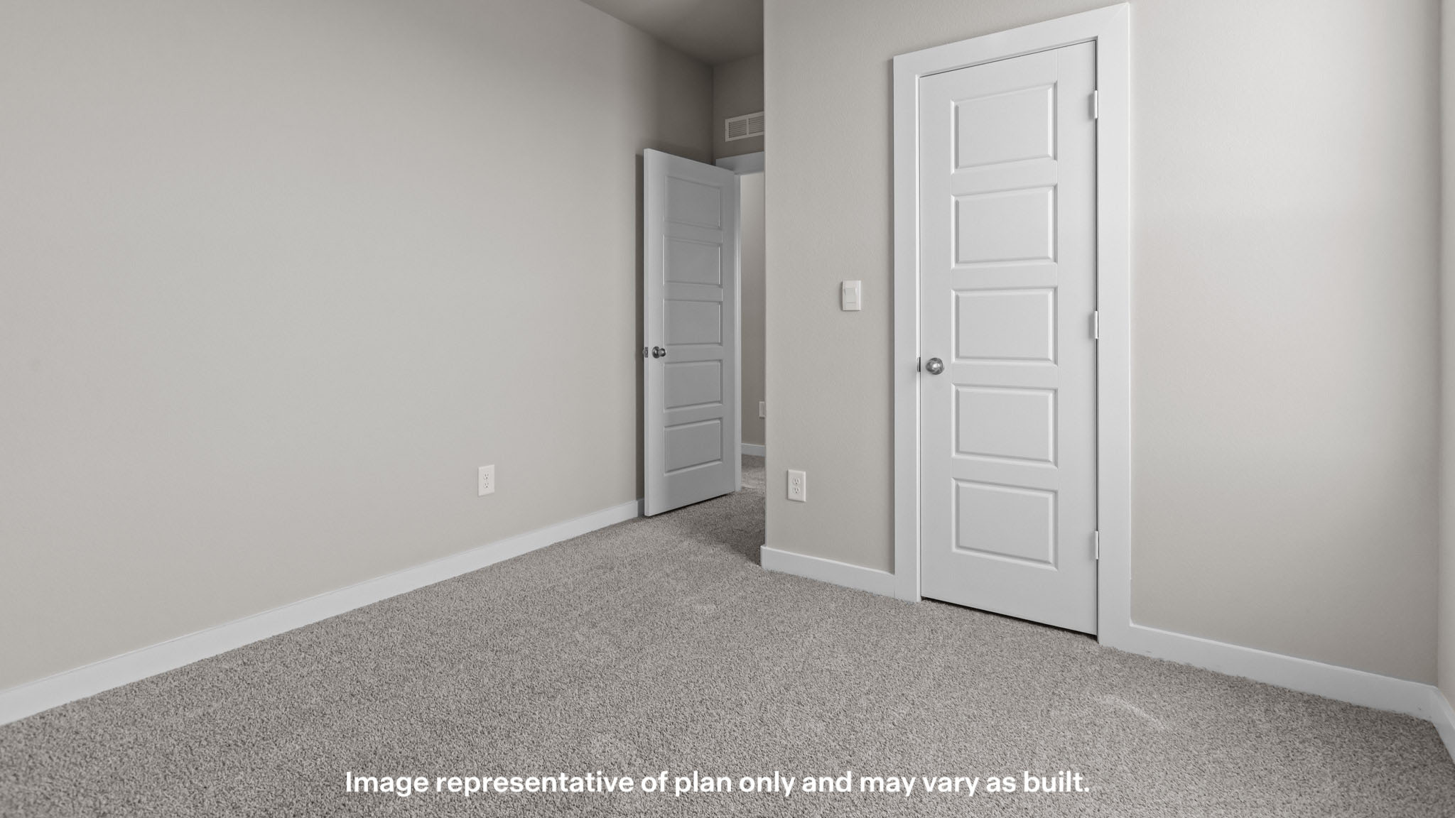 Upstairs guest bedroom 2 with plush carpeted floors and ample natural light