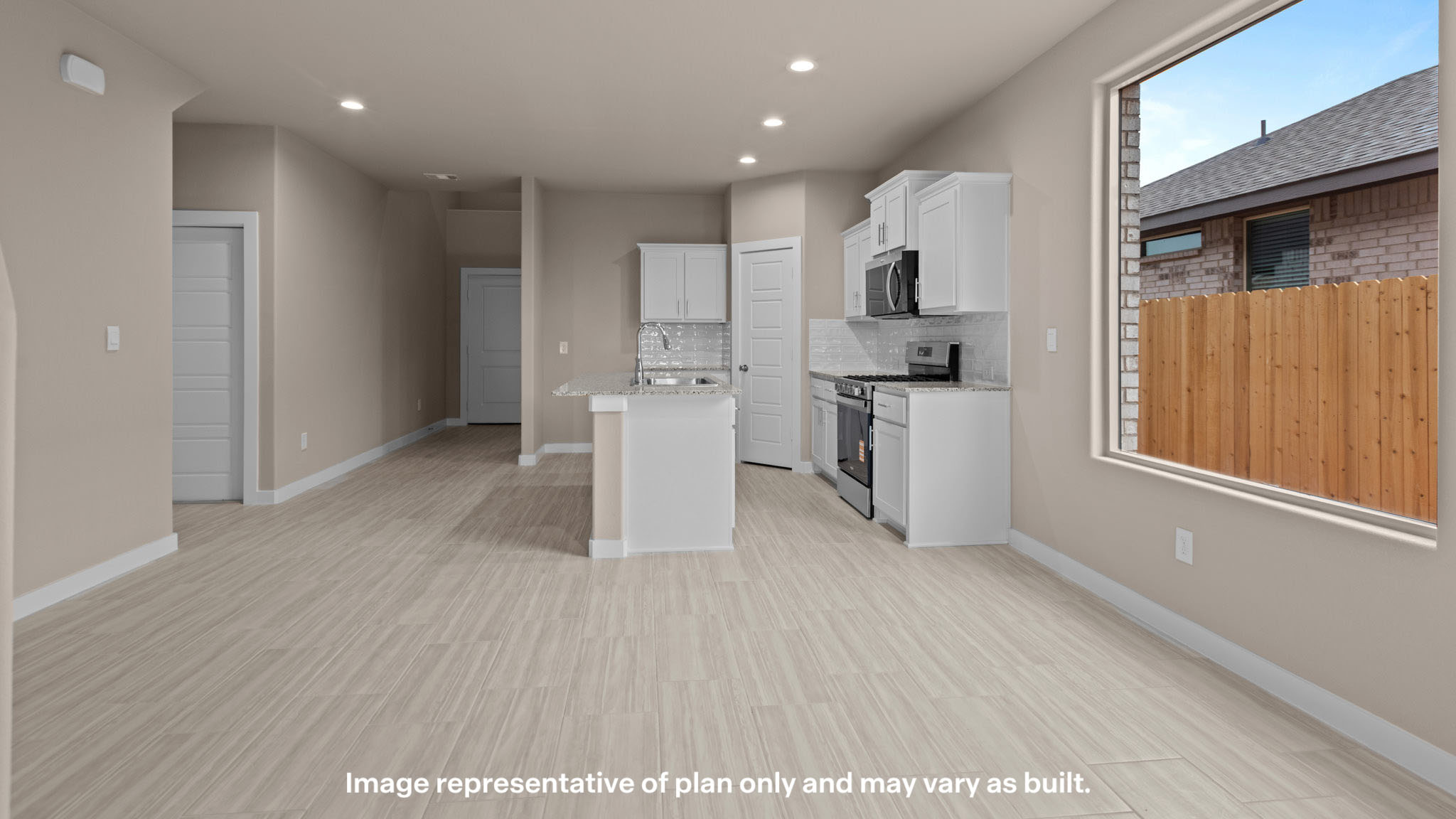 Spacious open kitchen overlooking family and living space