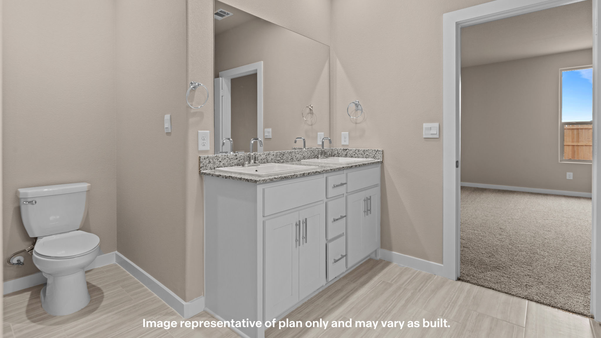 Private attached primary bathroom with built in vanity