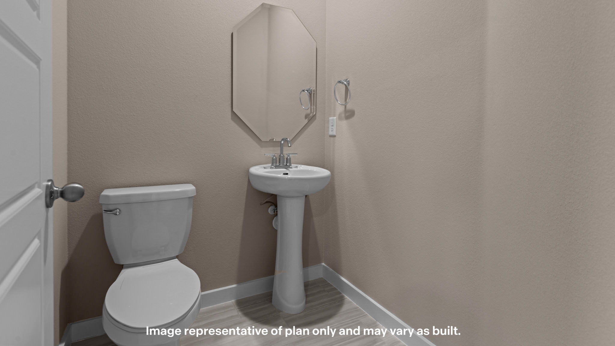 Half bathroom between common spaces