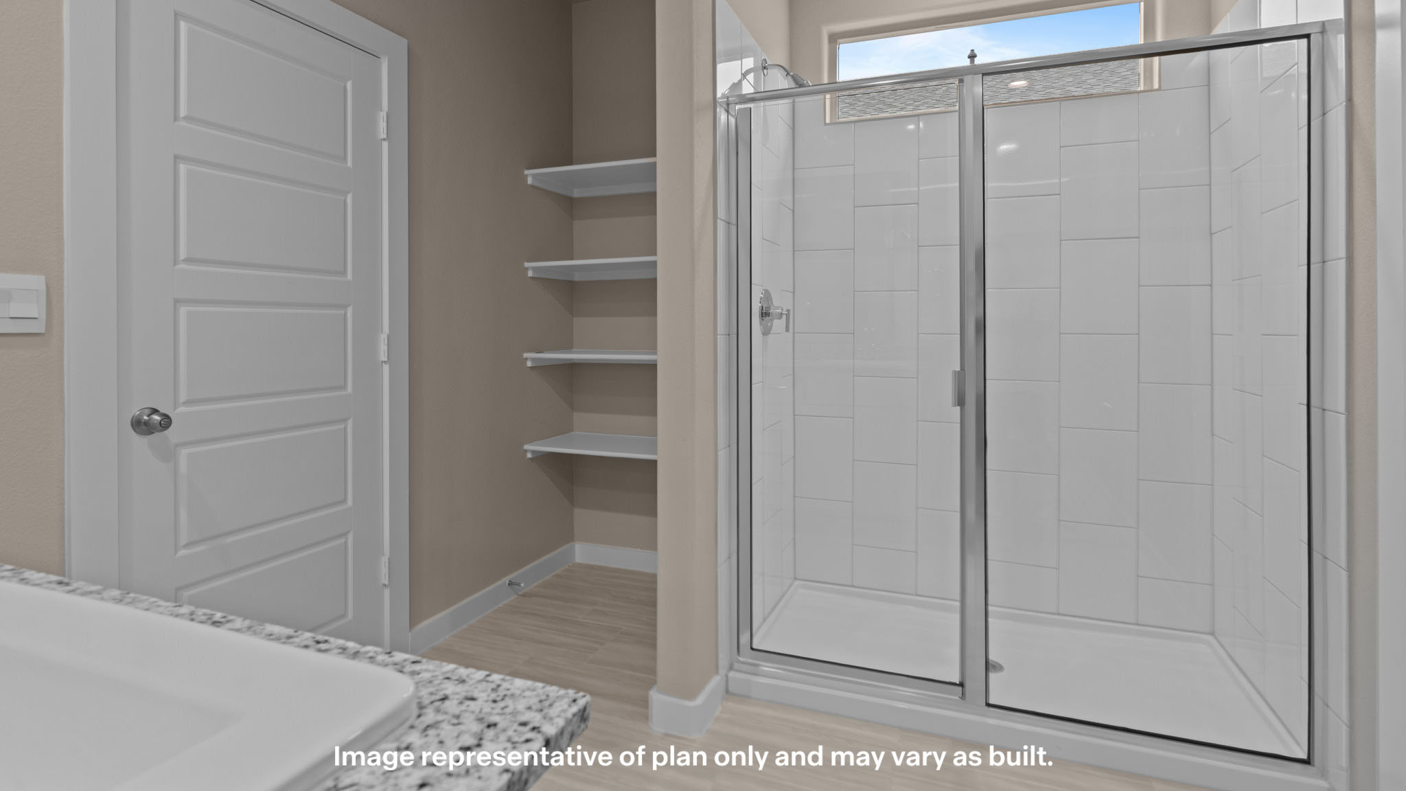 Primary bathroom with luxurious shower and built in storage