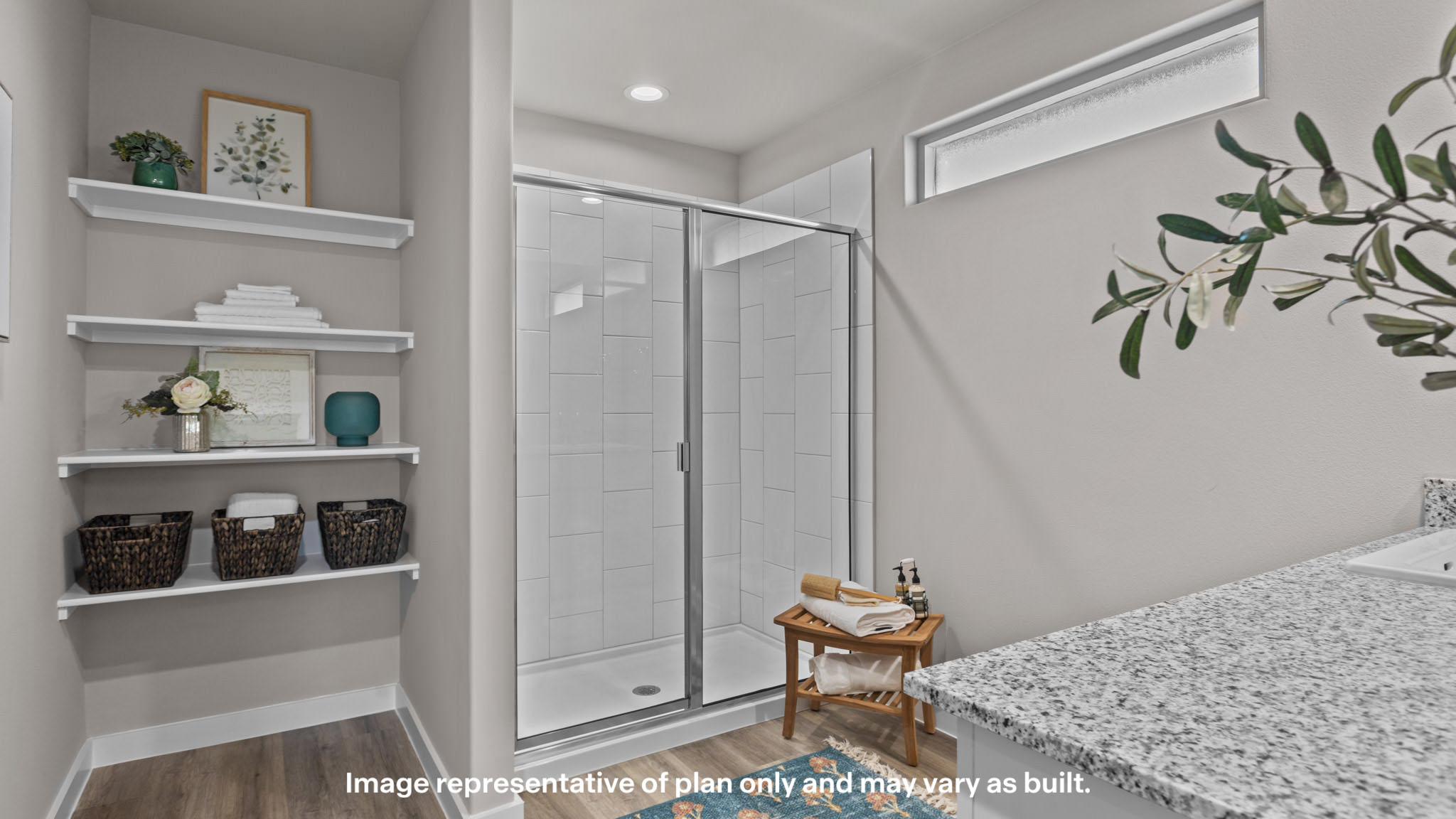 Primary bathroom with luxurious shower and built in storage