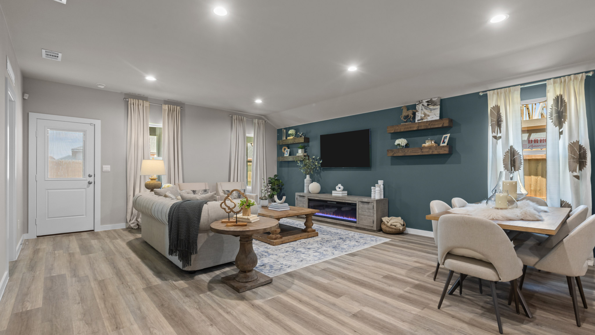 Open living and family room area with ample natural light