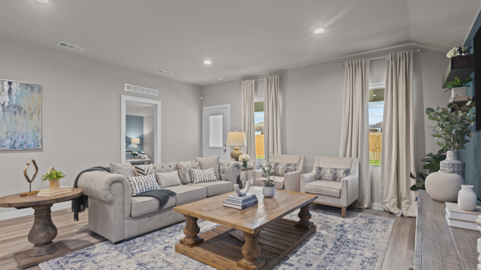 Open concept kitchen, living, family, and dining room space