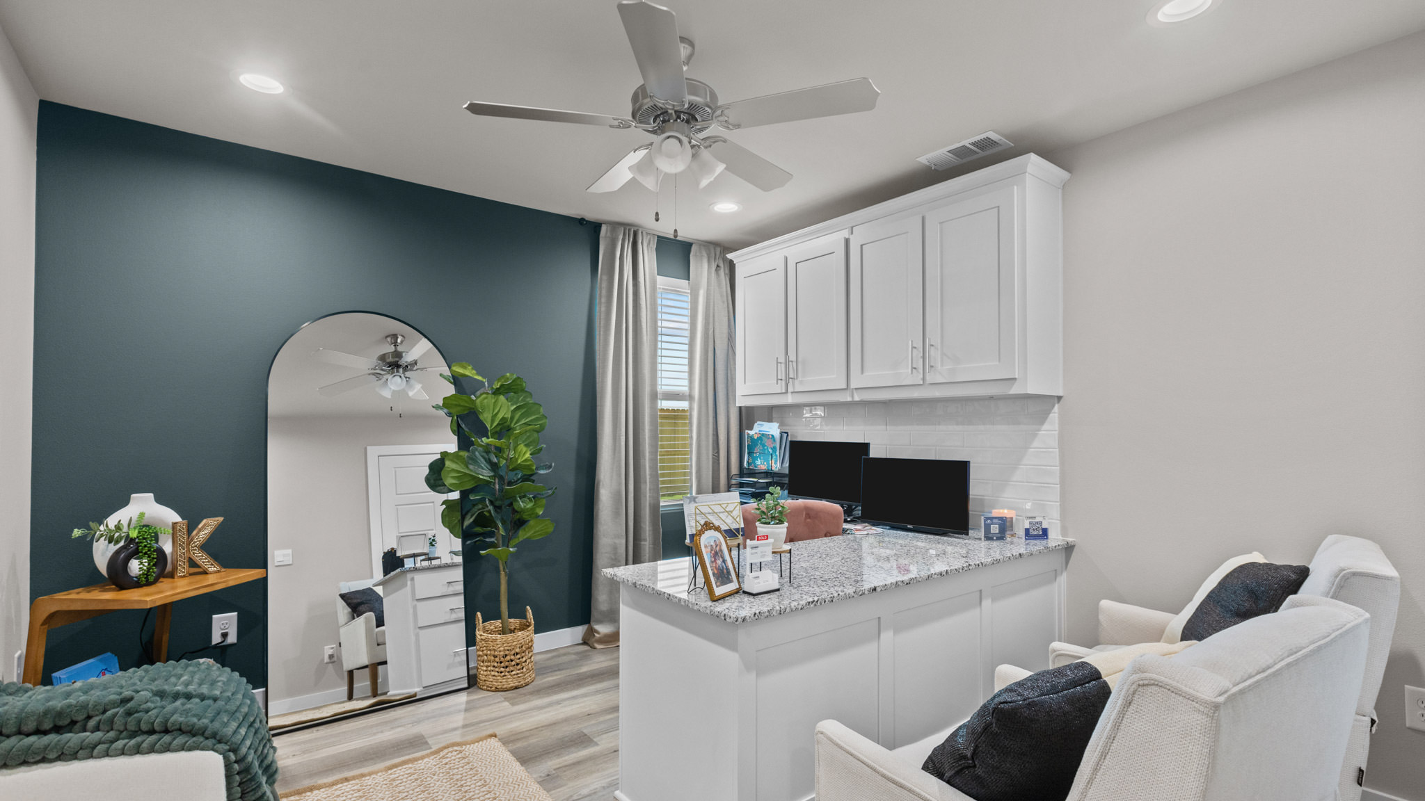 Guest bedroom 2 with side window and plush carpet floor