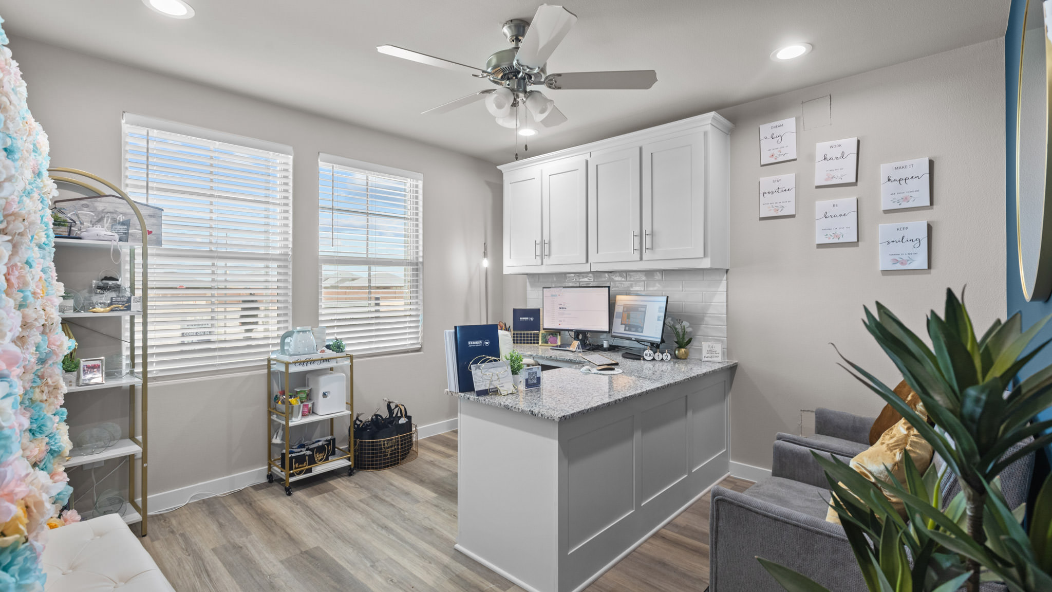 Guest bedroom 1 with front windows and ample natural light