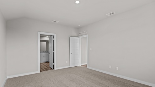 Primary bedroom with private attached bathroom