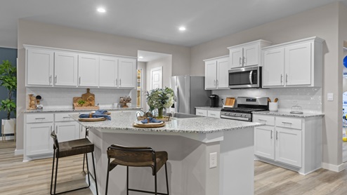 Modern white kitchen with spacious kitchen island