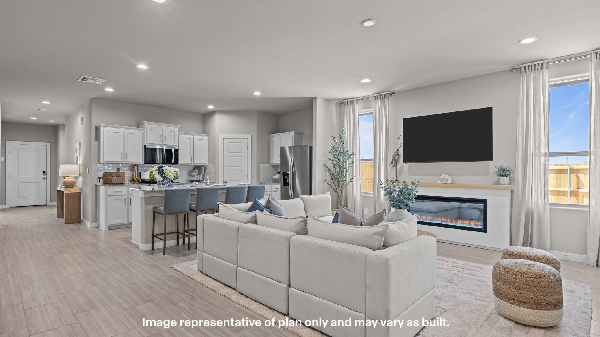 Open concept kitchen, living, family, and dining room space