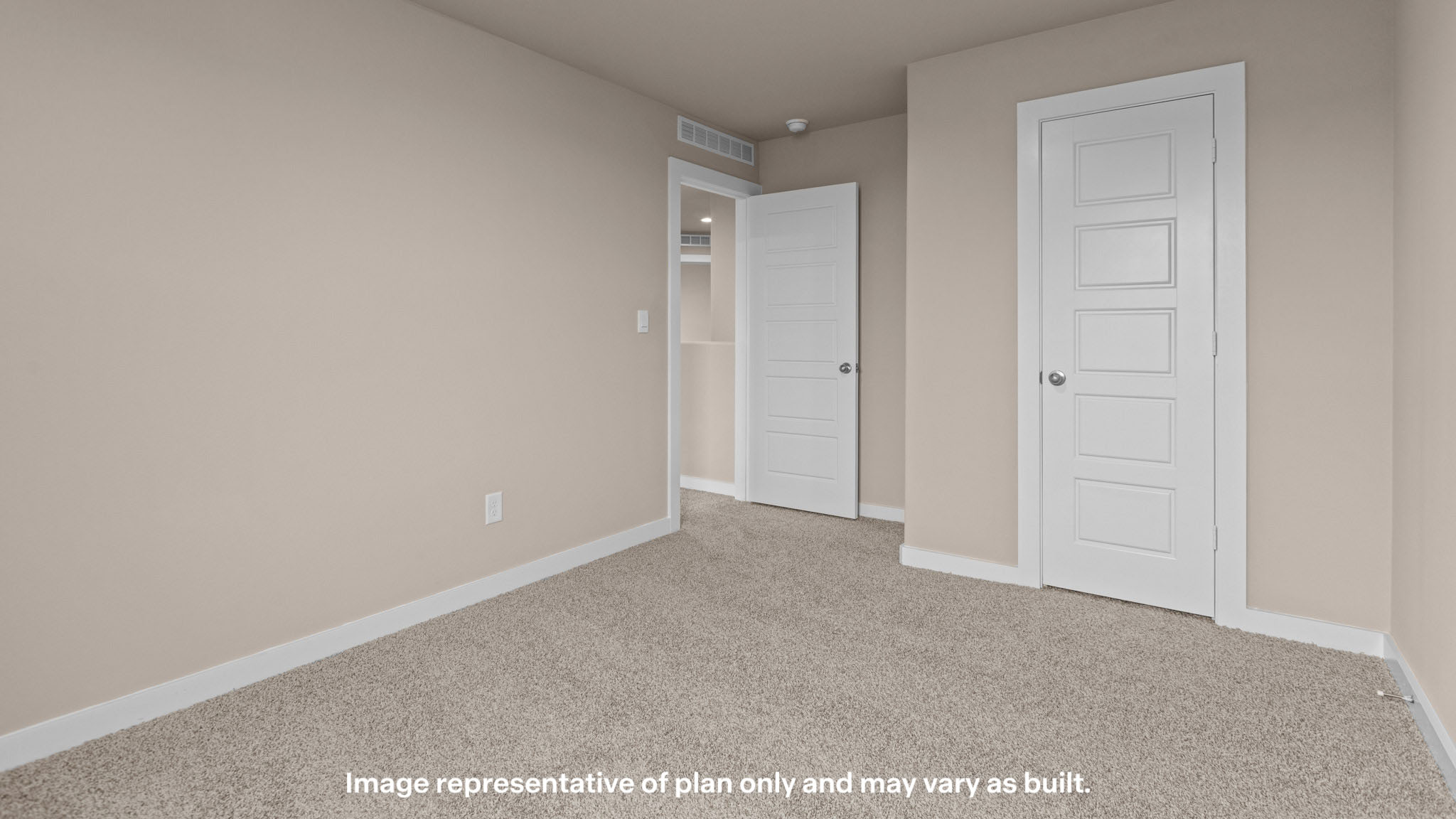 Upstairs guest bedroom 1 with plush carpet floors