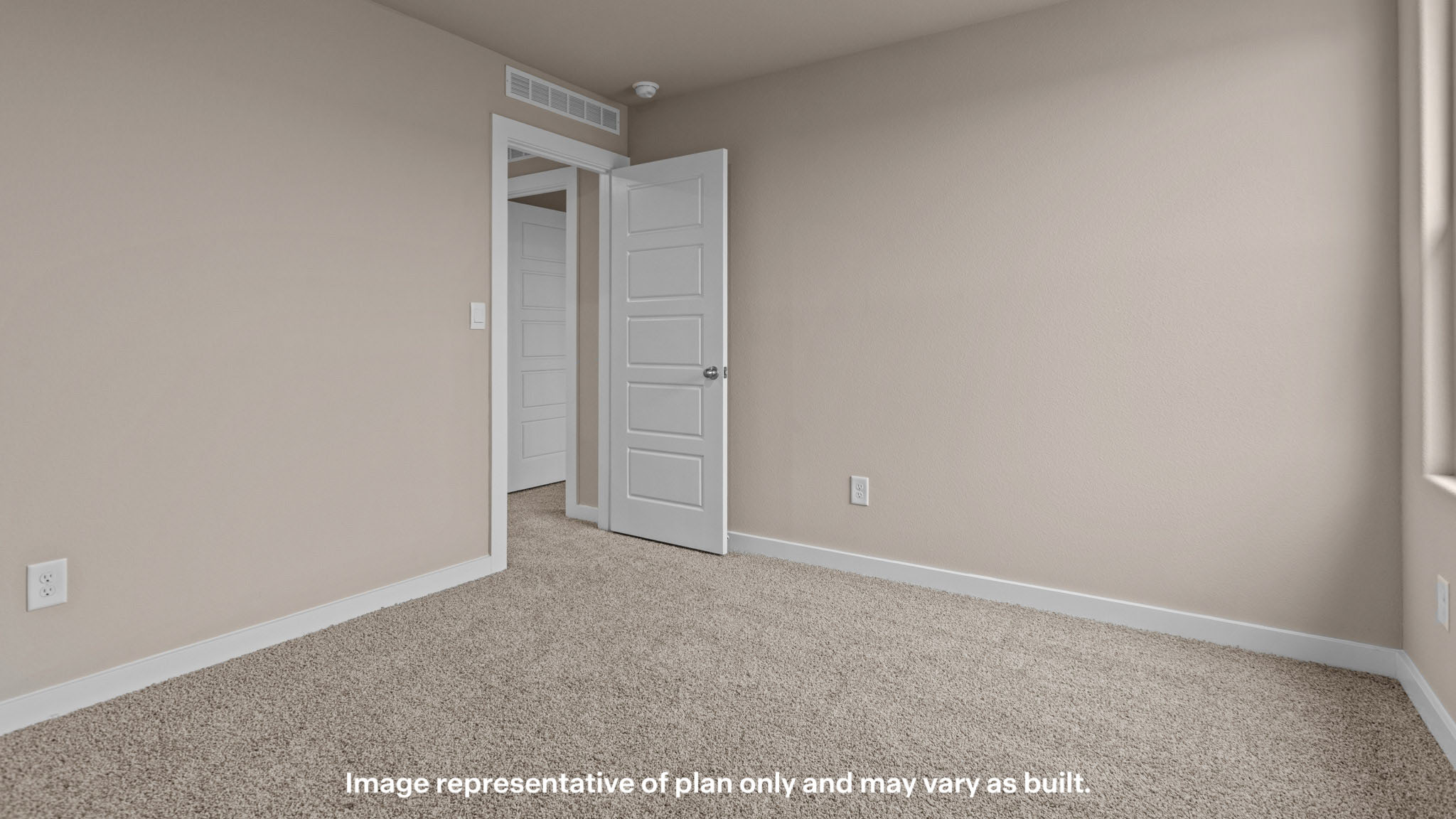 Upstairs guest bedroom 2 with plush carpeted floors and ample natural light