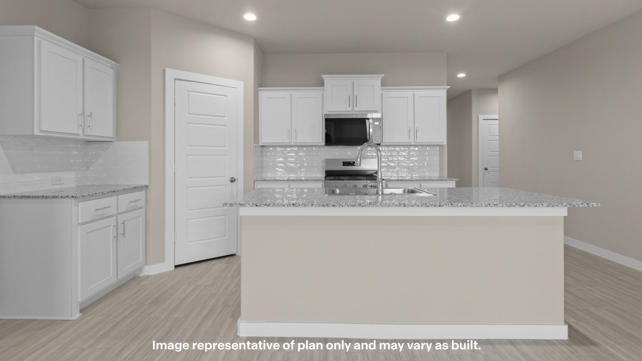 Spacious open concept kitchen with island and counter prep space