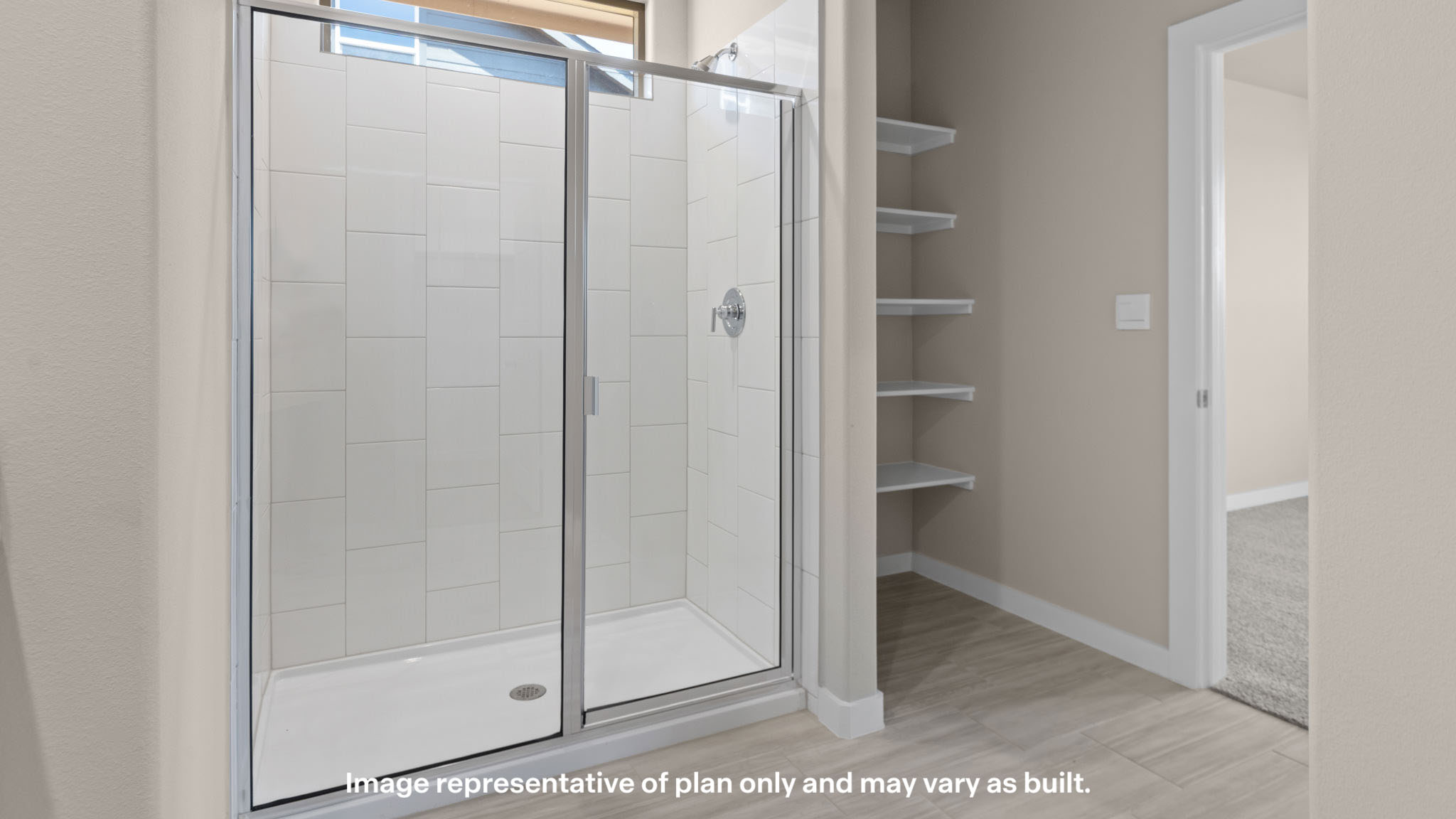 Primary bathroom with luxurious shower and built in storage