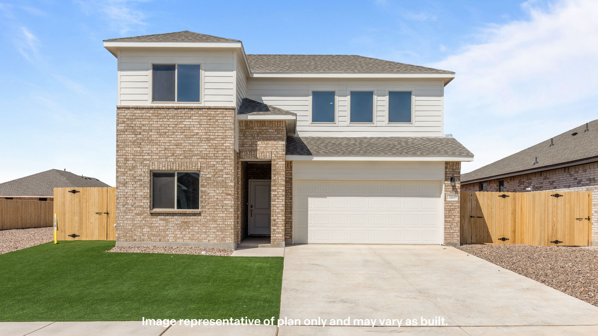 Side view of two story timeless brick home