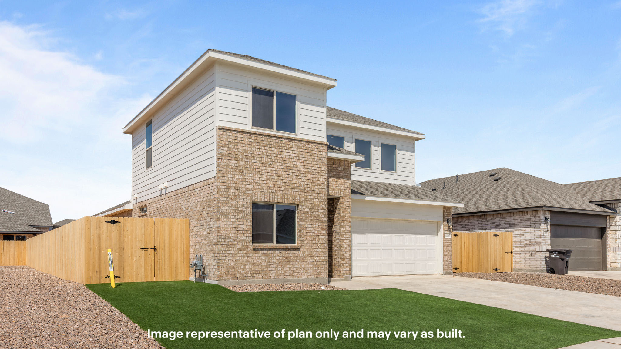 Side view of two story classic brick home